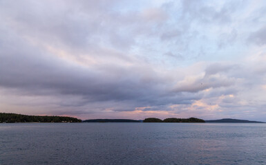 Scenic Sunset Over West Coast Waters in Vancouver Island, Canada