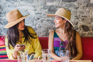 Tourists enjoying traditional ecuadorian meal in madrid restaurant