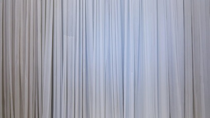 White grey curtain background. Abstract of curtain wall with light grey vertical stripes with copy space. Selective focus