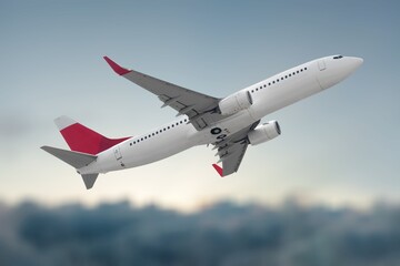 Flying airplane at blue sky background