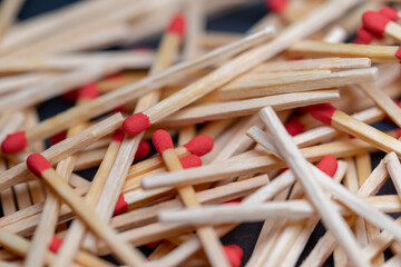 Cluttered and disorganized set of red-headed phosphor sticks
