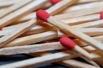 Cluttered and disorganized set of red-headed phosphor sticks