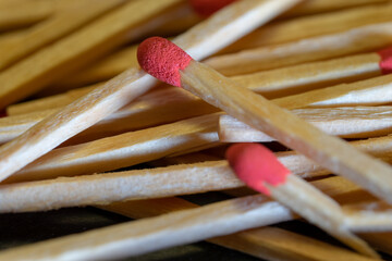 Cluttered and disorganized set of red-headed phosphor sticks