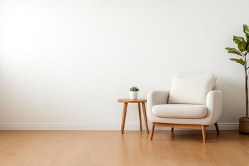 Simple and modern living room setup featuring a cozy chair, side table, and indoor plant