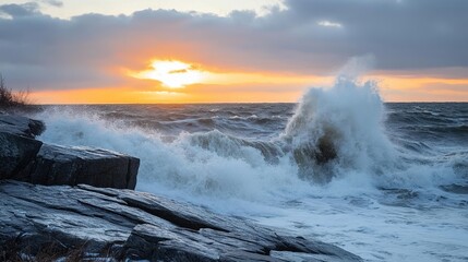 Powerful ocean waves crashing against rocky shores at sunset with vibrant pink and orange clouds reflecting on the water