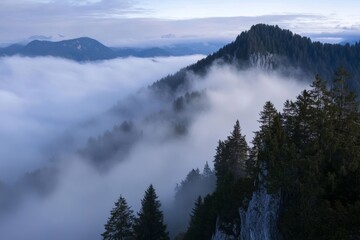 A mountain range covered in fog