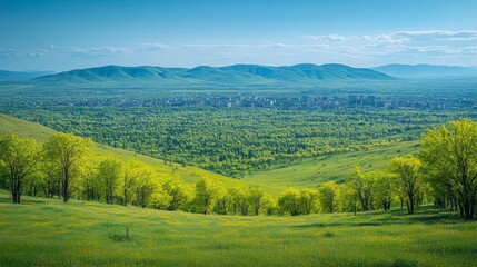 A lush green slope dotted with trees, with a cityscape in the background, creating a visual blend of natural beauty and modern architecture.