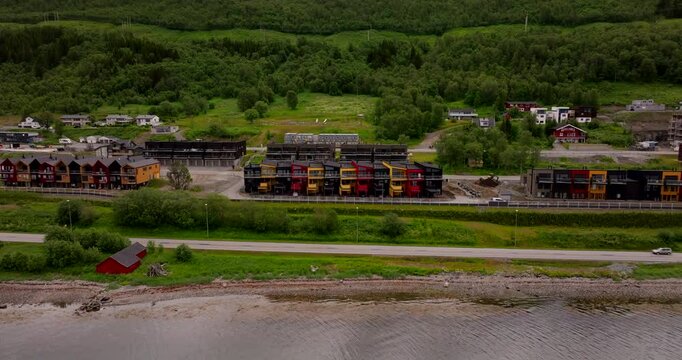 Modern Holiday Home Rentals Along Main Road E8 Near Tromso, Norway. Aerial Wide Shot