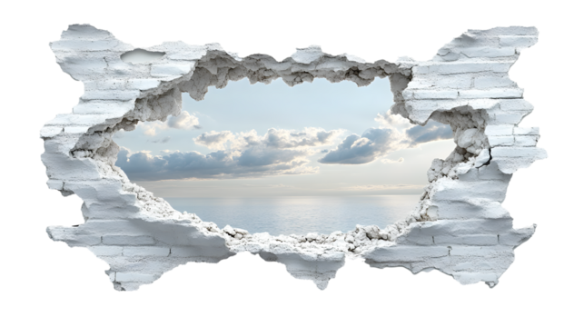 A white wall with a hole in it and a view of the ocean