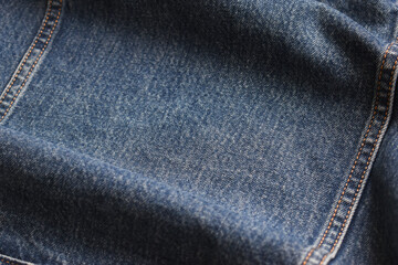 Naklejka premium seam of blue denim texture background, jean fashion style