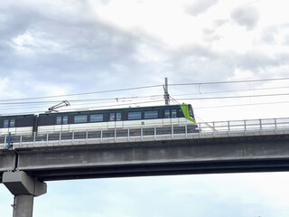 Modern Electric Train on Elevated Railway in Montreal, Quebec, Canada