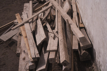 **10.** Close-up of stacked wooden beams, emphasizing structure and precision. Perfect for illustrating sustainable construction, architecture, and woodworking projects.  
