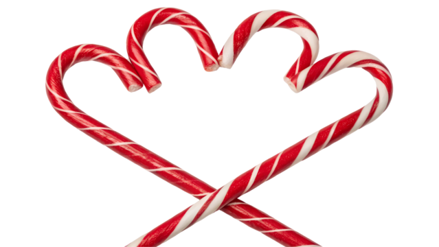 Two red and white candy canes crossed to form a heart shape ,PNG format