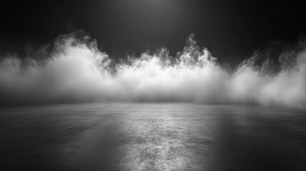 Empty gray concrete floor with a layer of fog or smoke, creating a dramatic and mysterious ambiance.