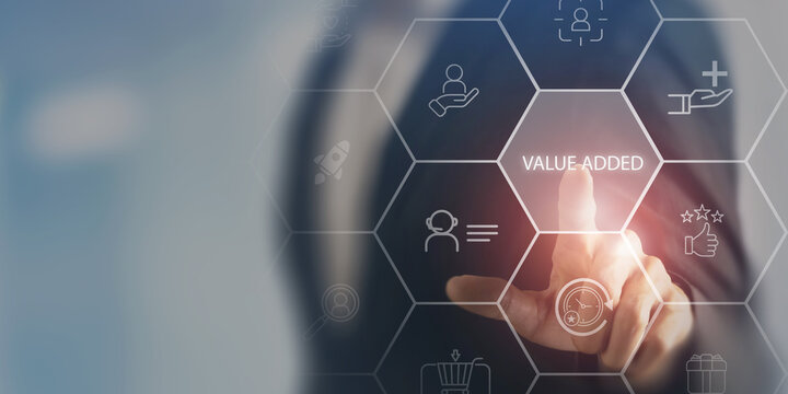 Value added concept. Touching on virtual screen to create values. Way to adding value to product and service. Improving products, excellent service, expert advice, consistently upgrade, deliver fast.