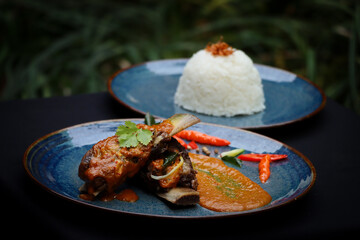 grilled ribs eye with rice and vegetables natural background