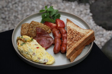 meat sausage and vegetables american breakfast