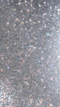 Glittering silver surface with iridescent holographic effects and micro-glitter accents, futuristic, micro gliter, glitter