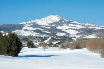 Snowy Mountain Landscape Under Clear Blue Sky