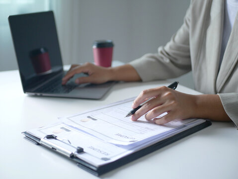 Businesswoman employer holding resume, recruiting, planning, evaluating and reviewing resume of job applicant, recruiting new employees, recruitment concept
