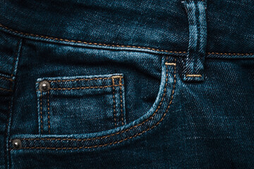 Jeans seam. Jeans pocket. Jeans texture or denim background. Denim sales. Jeans fabric texture. Jean trousers pants. Blue denim cloth. Denim texture for background design.
