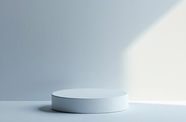 Minimalist white podium on light grey background with sunlight.