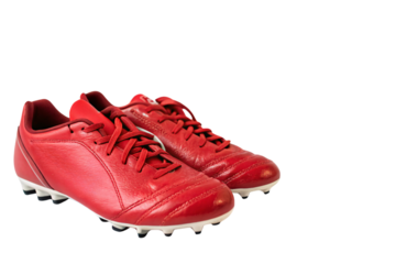 Sleek red soccer cleats with detailed stitching and sturdy white soles, combining a vibrant aesthetic with professional-grade design for peak on-field performance, against on a transparent background
