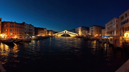 Fototapeta premium Scenic Evening View of Grand Canal with Lighted Buildings at Dusk