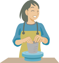 手びねり陶芸で陶器を作る女性