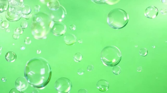 flying soap bubbles on green screen background,bubbles are floating 