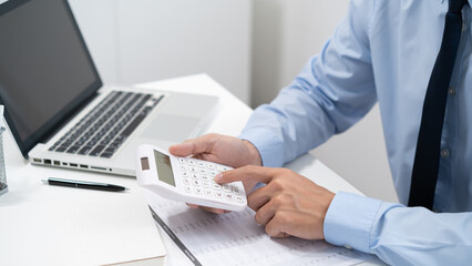 Auditor or internal revenue service staff, Business men checking annual financial statements of company. Audit Concept.