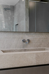 The bathroom sink should be made of marble, that's the trend these days