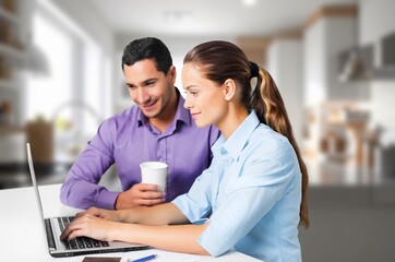 Happy young Couple work with documents at home