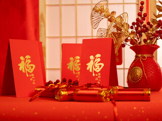 Chinese new year festival decorations with red bags, oranges and red Chinese folded fans on white marble background. Celebrate Happy Chinese new year. All Brushscript Texts in Chinese meaning luck.