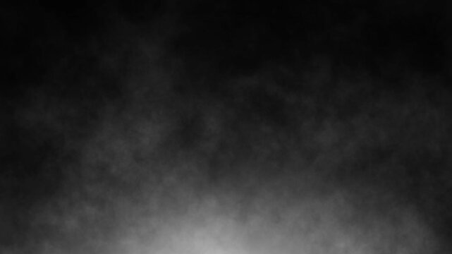 Loopable abstract swirling smoke and a soft, radiant light rising from below against a black background - useful as an overlay layer, dynamic and ethereal fog effect
