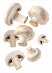 Champignon mushrooms, and cut, On isolated white background. Clipping path - full depth