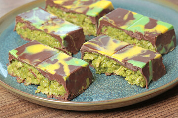 Dubai chocolate bar with pistachio paste and kataifi dough. Confectionery and sweets.