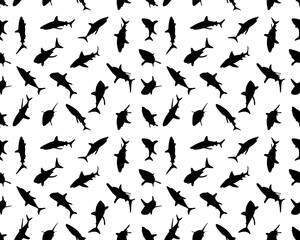 Black silhouettes of sharks on white background, seamless illustration 