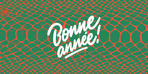 and text "Bonne Annee'' Happy New Year phrase in french. The lettering is hand drawn. The background is abstract art with red and green patterns, Christmas atmosphere.