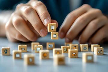 Hands arranging wooden blocks with app icons.