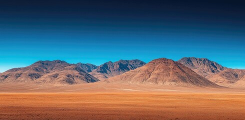 Naklejka premium the red desert and mountains in Australia, with a blue sky