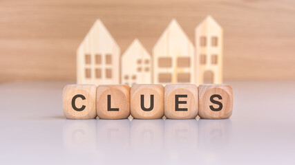 Wooden Blocks Spelling Clues with Beautiful Miniature Houses for Creative Minds to Explore