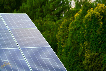 Roof solar panels blending with blue sky