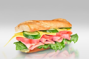 Tasty fresh sandwiches with vegetables on the desk