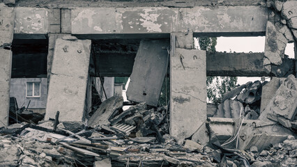 destroyed and burned houses in the city in Ukraine