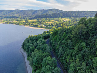 scenic forest road by the lake