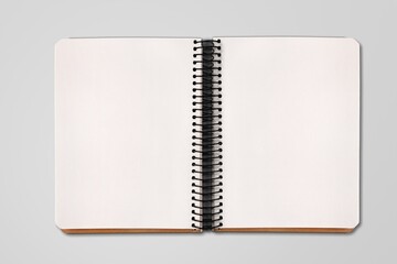 Blank white spiral notebook on the desk