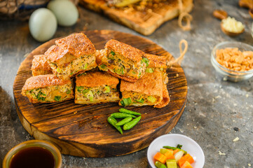 Martabak asin, Murtabak, Mutabbaq, stuffed pancake or pan-fried bread street food
