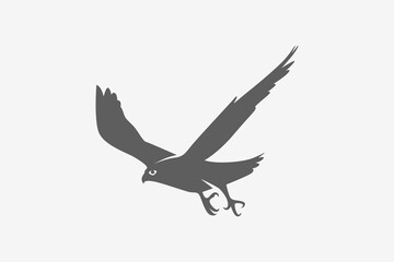 Falcon move fast attack silhouette logo or symbol vector