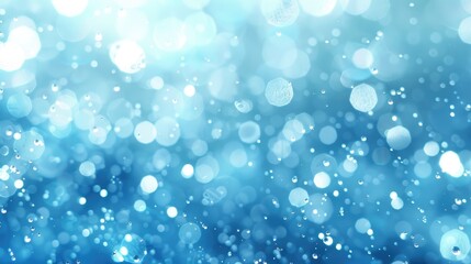 Obraz premium A blurred background of sparkling blue bubbles, creating a serene and dreamy atmosphere.